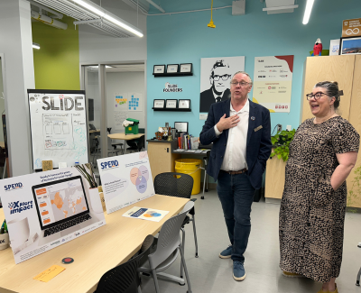Kevin Holmes shows off the SLiDE lab to CICan president Pari Johnston
